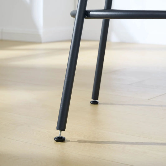 Bar stool legs in black metal with floor glides on light hardwood floor on Tampa Home & Garden Store
