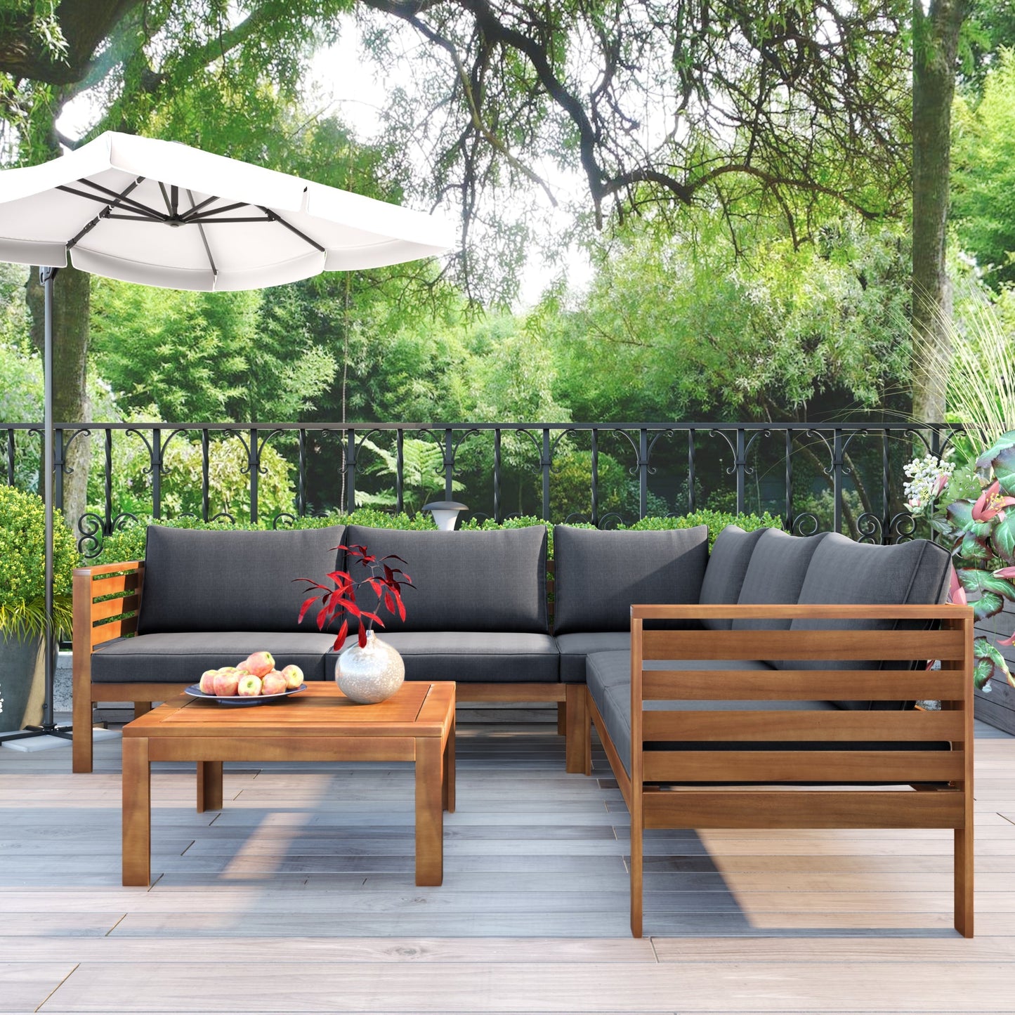 Wood outdoor sofa set with gray cushions and coffee table in a garden setting by HouseOfZazla on Tampa Home & Garden Store