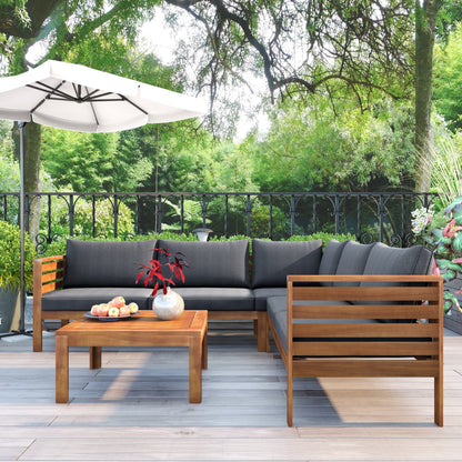 Wood outdoor sofa set with gray cushions and coffee table in a garden setting by HouseOfZazla on Tampa Home & Garden Store