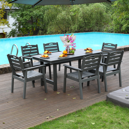 HDPE outdoor dining set by HouseOfZazla with table and six dark gray chairs by pool on Tampa Home & Garden Store