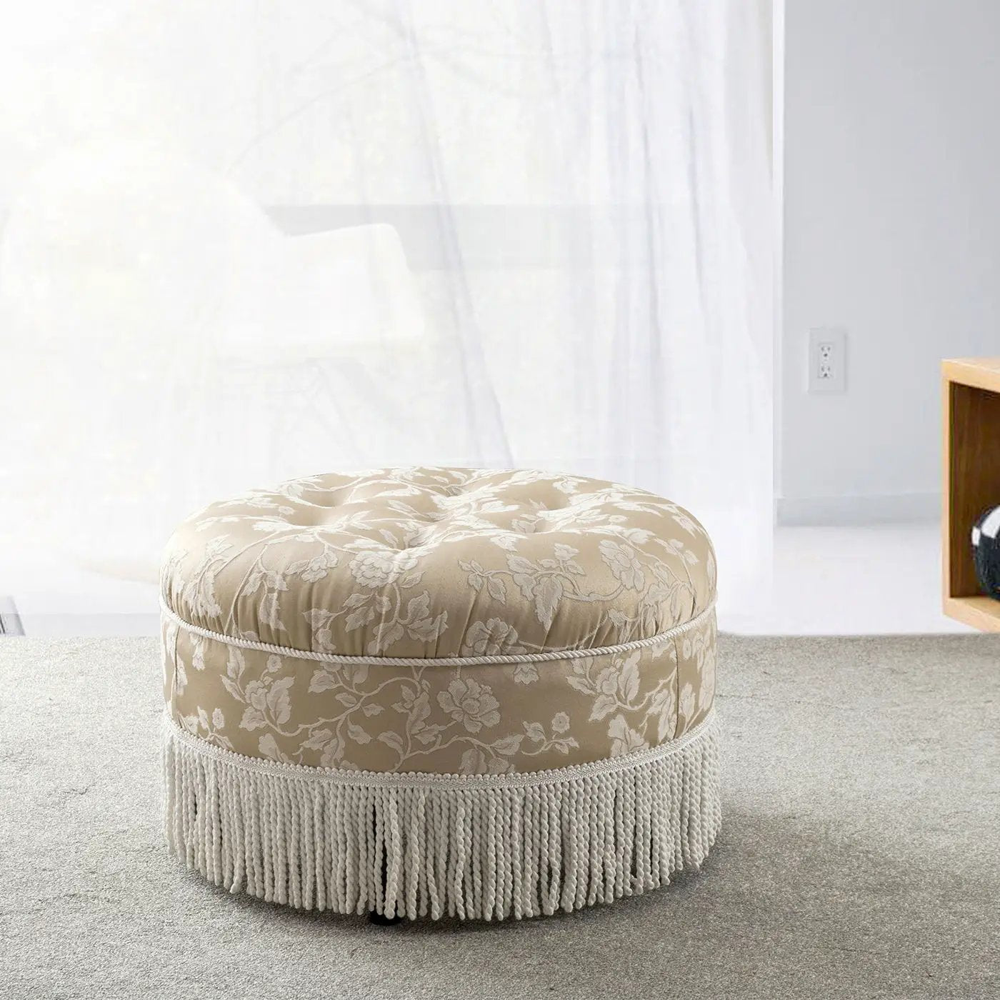 Yolanda Round Upholstered Accent Ottoman in beige damask fabric with rope trim and fringe on Tampa Home & Garden Store