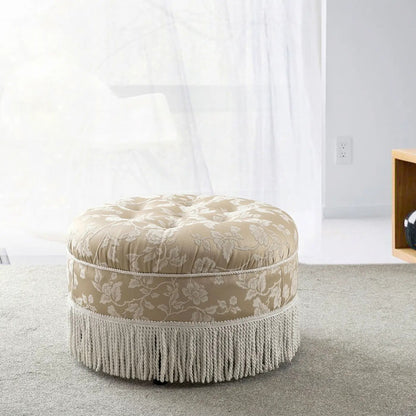 Yolanda Round Upholstered Accent Ottoman in beige damask fabric with rope trim and fringe on Tampa Home & Garden Store