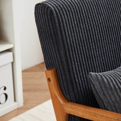 Accent arm chair with charcoal gray ribbed upholstery and wooden armrests on Tampa Home & Garden Store