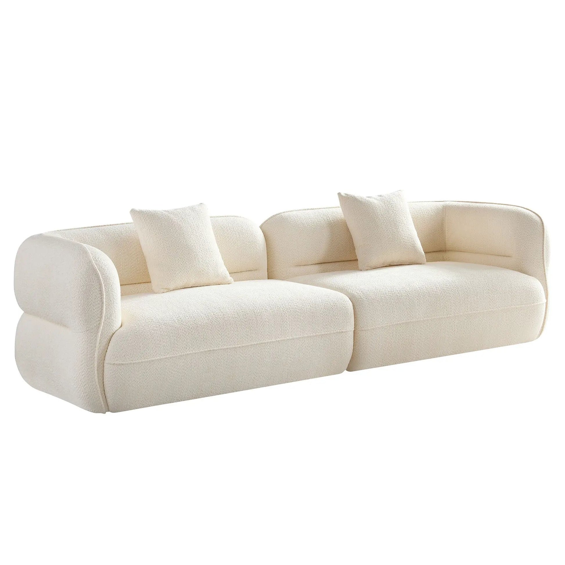 Sectional sofa in cream boucle fabric with rounded arms and three plush cushions on Tampa Home & Garden Store