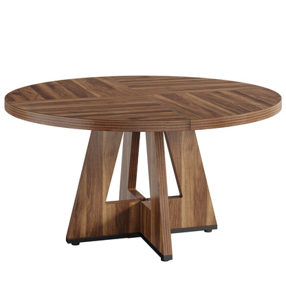 Round dining table in walnut wood finish with a cross-base pedestal on Tampa Home & Garden Store