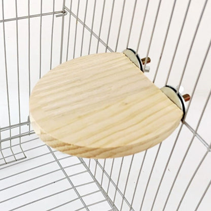 Solid wood round bird cage jumping platform with natural finish mounted to cage bars on Tampa Home & Garden Store