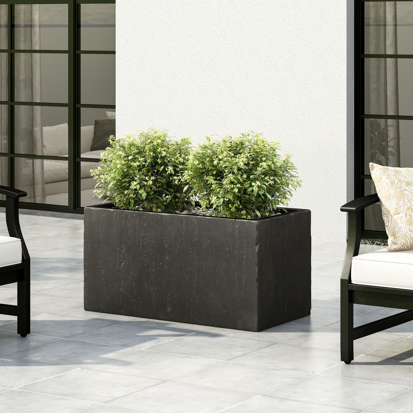 Modern Outdoor Planter, black rectangular pot with green shrub on a patio on Tampa Home & Garden Store
