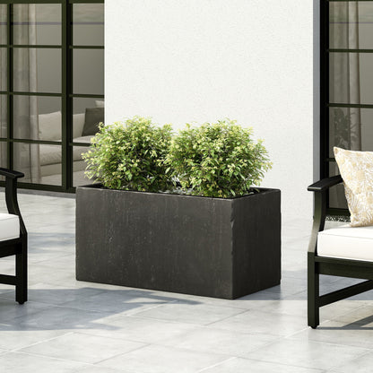 Modern Outdoor Planter, black rectangular pot with green shrub on a patio on Tampa Home & Garden Store