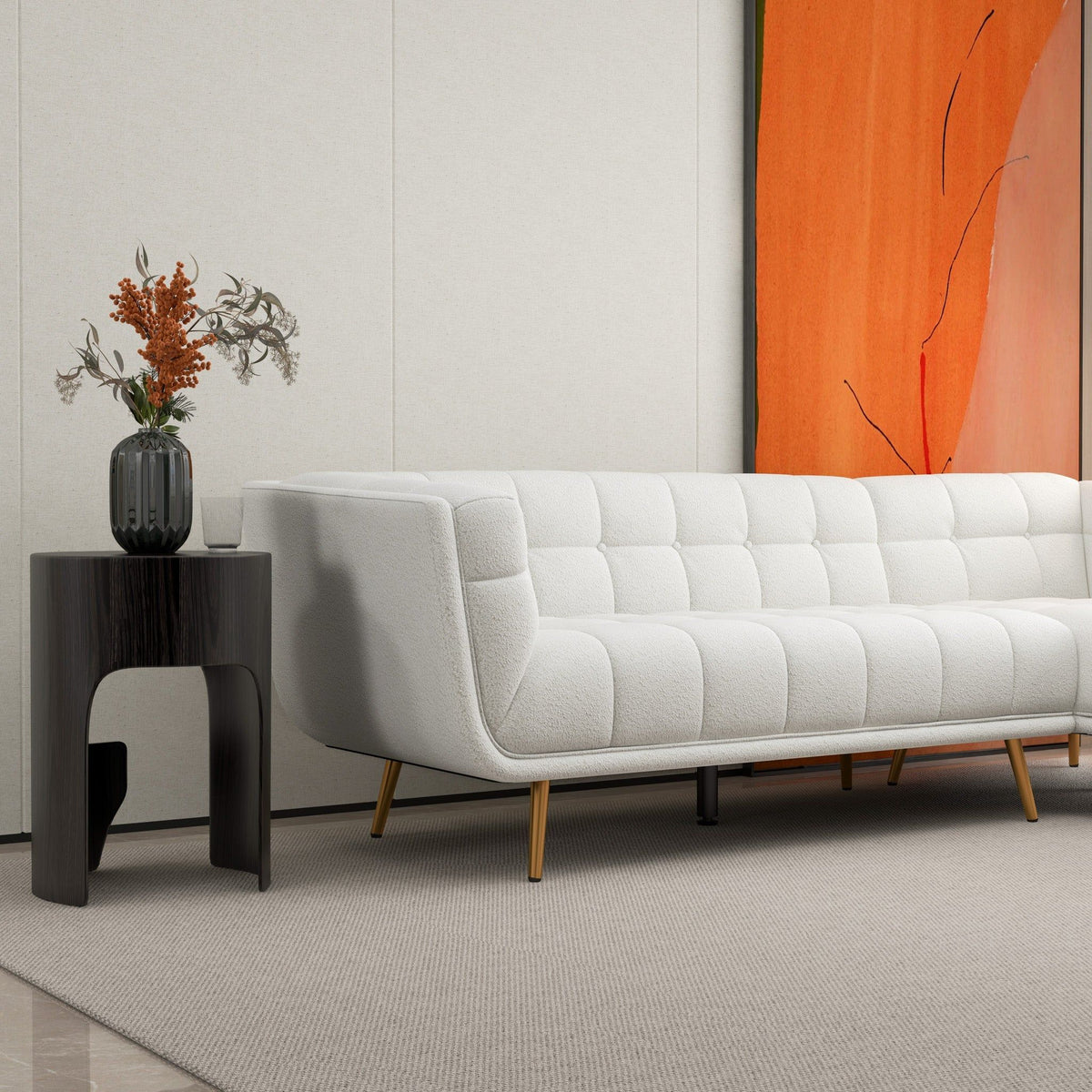 Beige L-shaped tufted sectional sofa with mid-century modern design and gold legs on Tampa Home & Garden Store