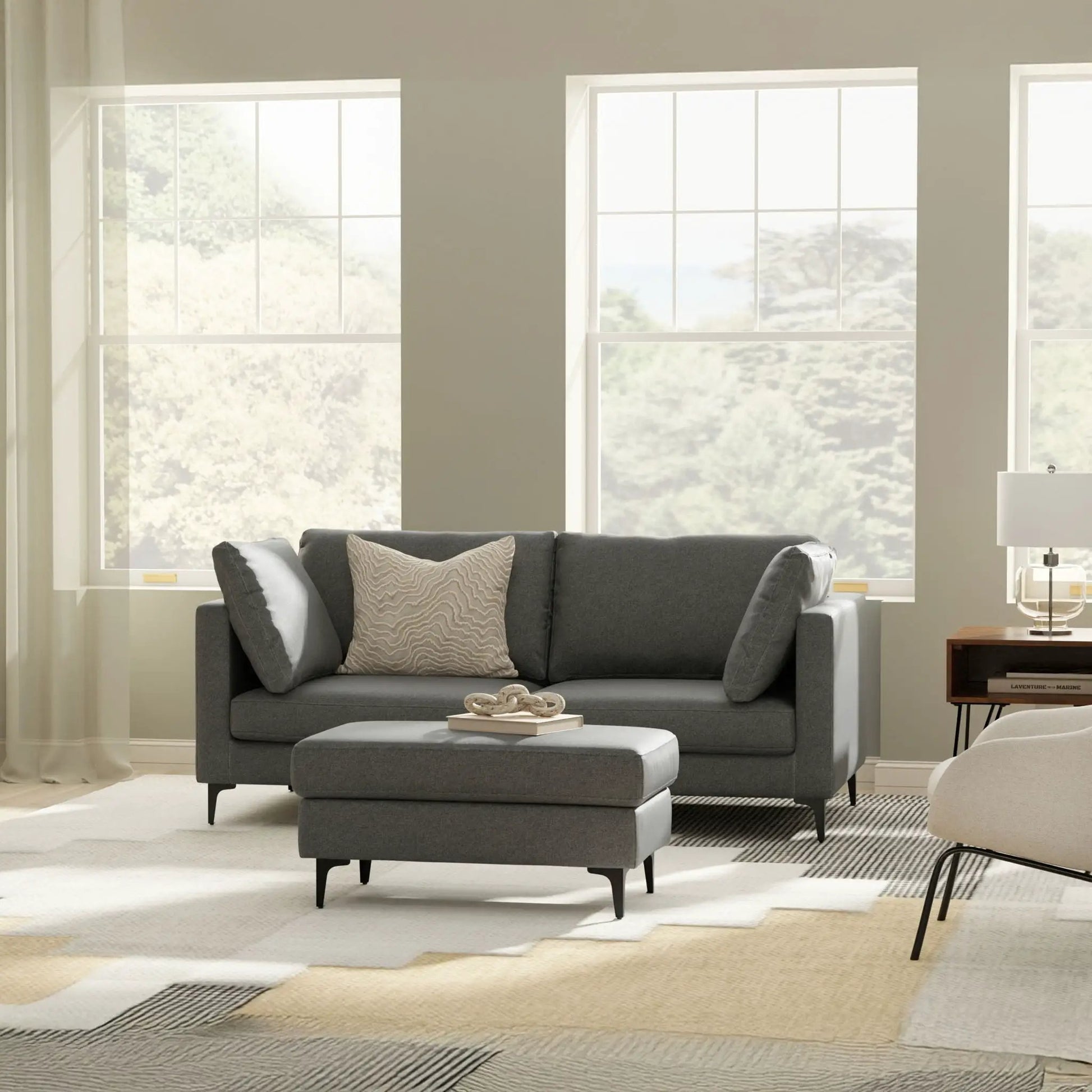 Ava - Mid Century Sofa, gray upholstered with matching ottoman and black metal legs on Tampa Home & Garden Store