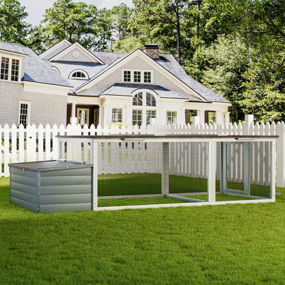 Large chicken coop with 20.93 sq ft run, gray siding and wired mesh run beside a picket fence on Tampa Home & Garden Store