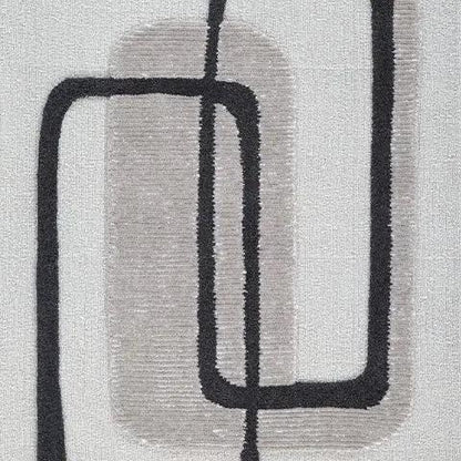 Davismour area rug by Unique Piece Furniture; abstract taupe and black rounded-rectangle motif on Tampa Home & Garden Store