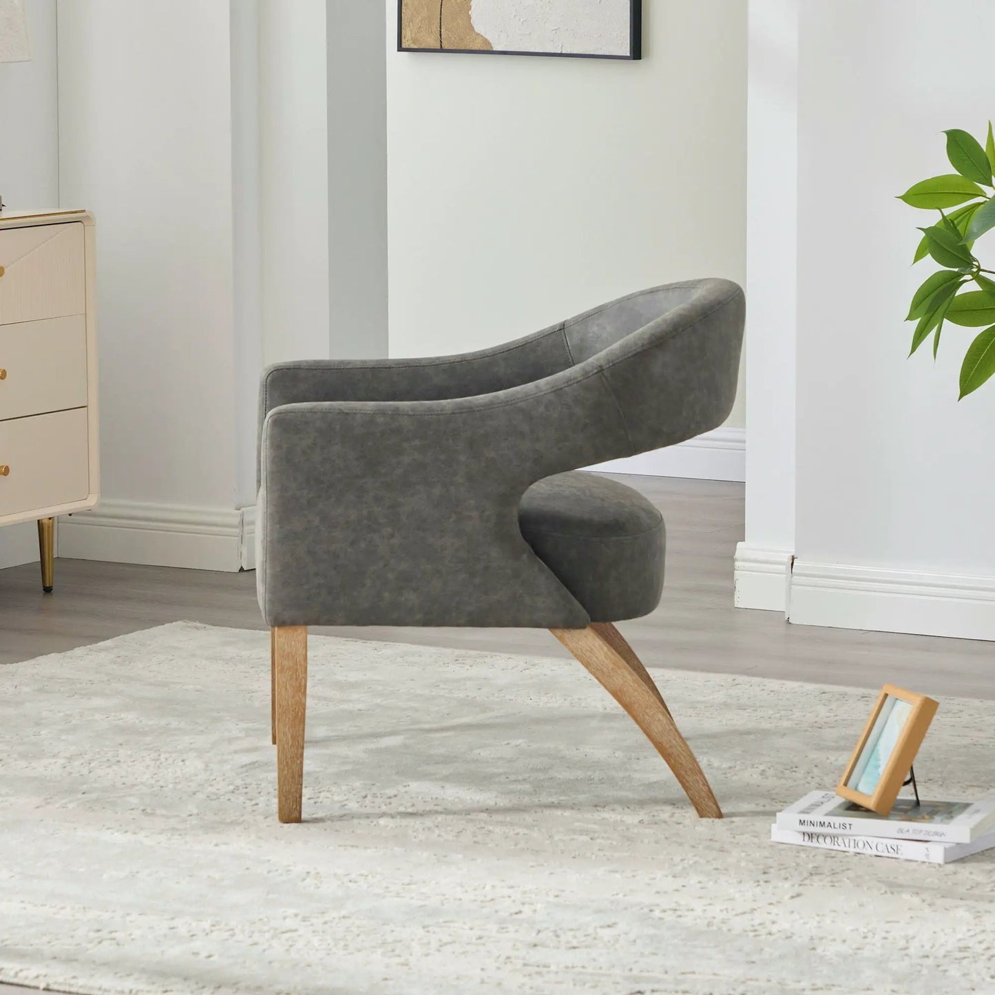 Upholstered open-back armchair in gray fabric with weathered rubberwood legs on Tampa Home & Garden Store