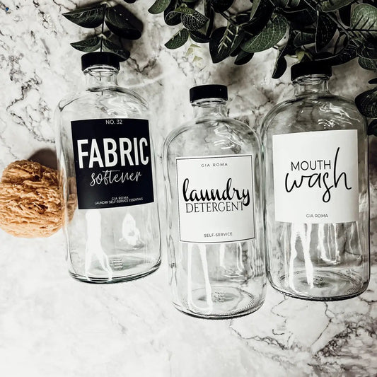 Three 32oz clear glass dispensers labeled fabric softener, laundry detergent, mouthwash Gia Roma on Tampa Home & Garden Store