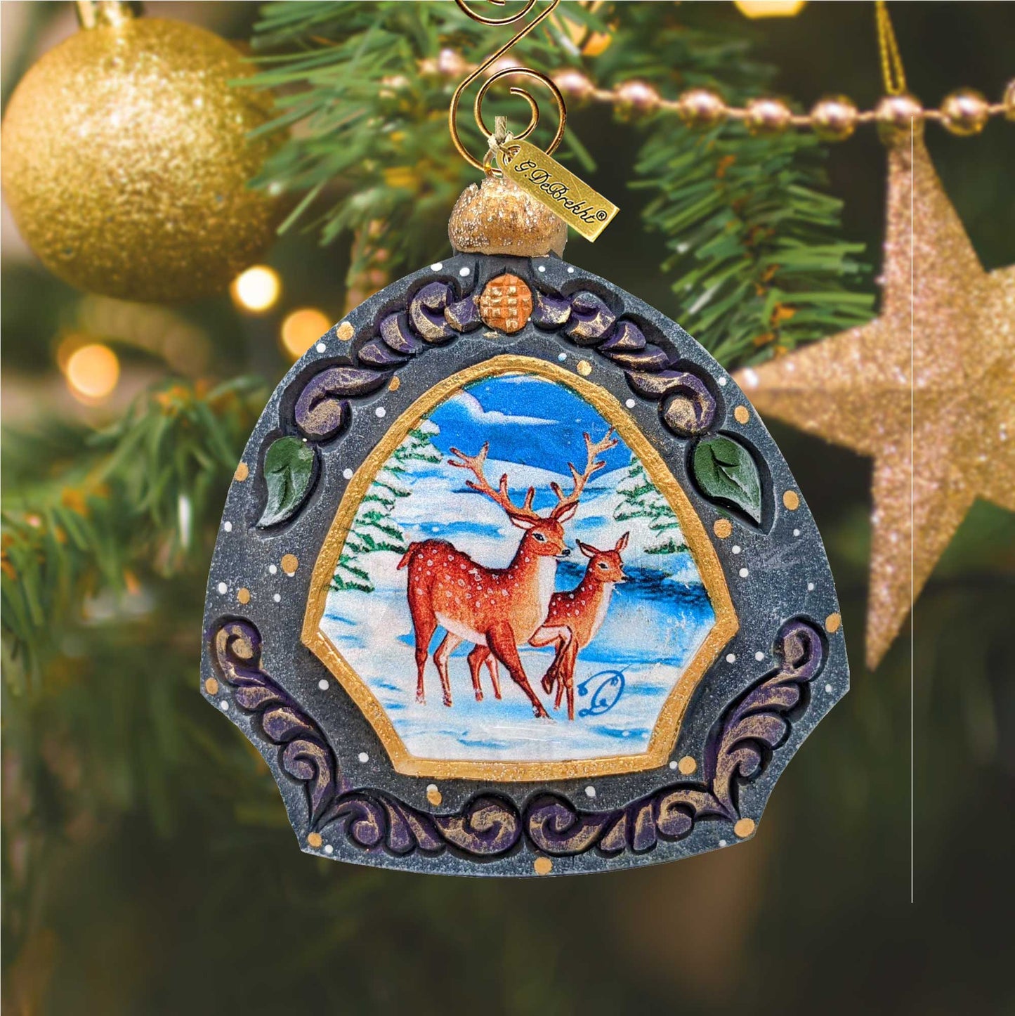 Hand Painted Scenic Deer Family Ornament by G. DeBrekht; dark blue carved frame with gold trim on Tampa Home & Garden Store