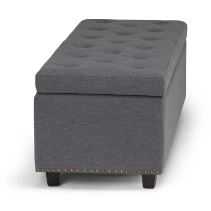 Hamilton Upholstered Storage Ottoman, gray fabric, tufted top, nailhead trim on Tampa Home & Garden Store
