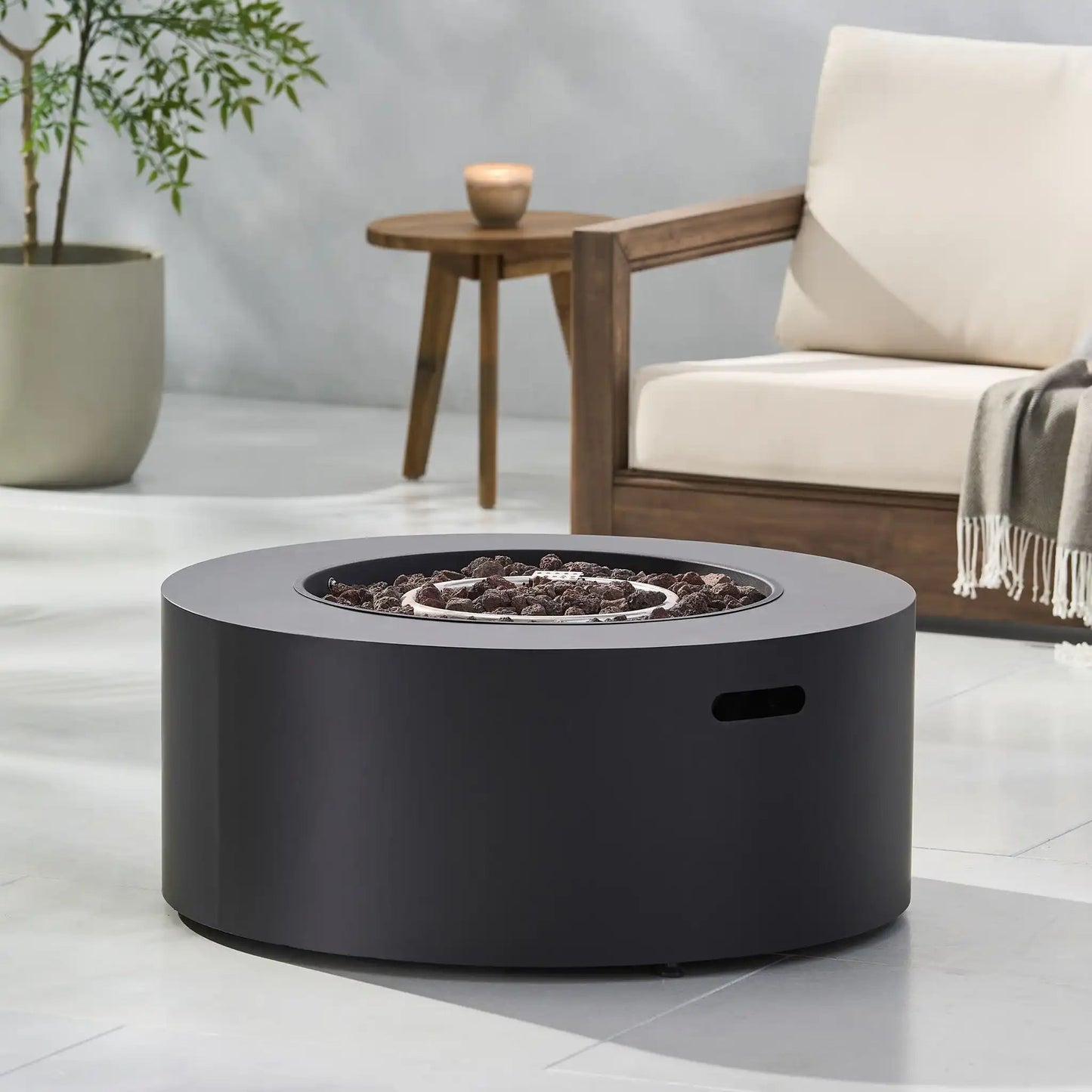 Round iron fire pit in black with lava rocks, 40,000 BTU, HouseOfZazla on Tampa Home & Garden Store