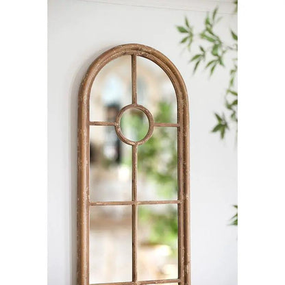 Half round elongated arched mirror with brown fir wood frame and circular window motif on Tampa Home & Garden Store