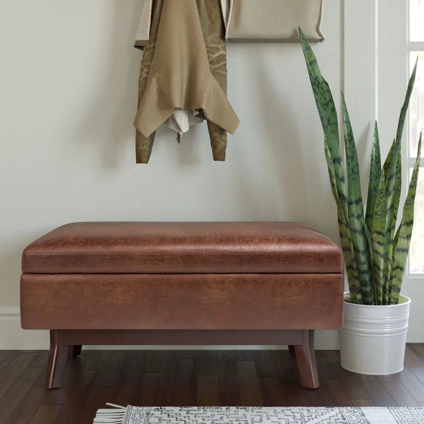 Owen upholstered rectangular storage ottoman in brown leather with tapered legs on Tampa Home & Garden Store