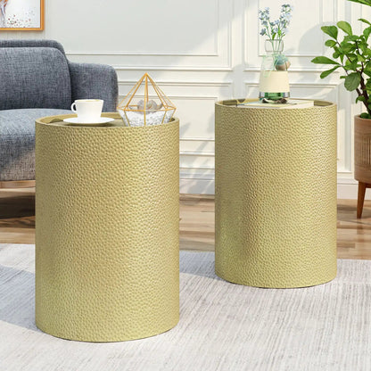 Modern Round Accent Table With Hammered Surface in gold metal, shown in a stylish living room on Tampa Home & Garden Store
