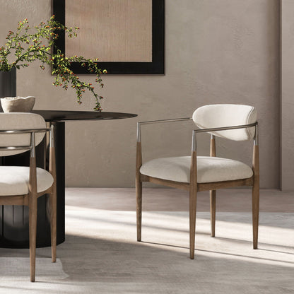 Artemis mixed material upholstered dining arm chair with brushed nickel arms in warm white on Tampa Home & Garden Store