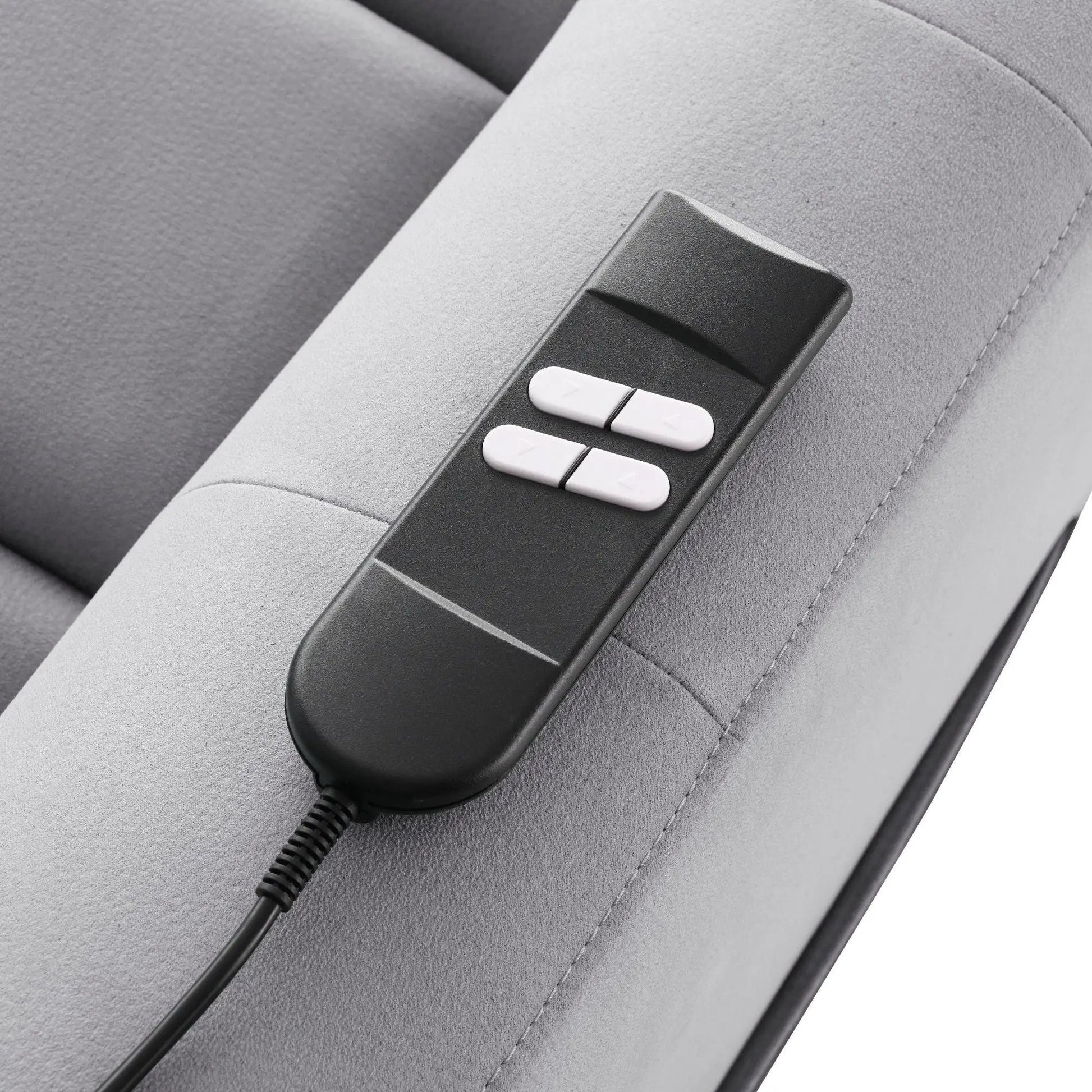 Freddie power motion recliner with lift in gray upholstery, remote control visible on Tampa Home & Garden Store