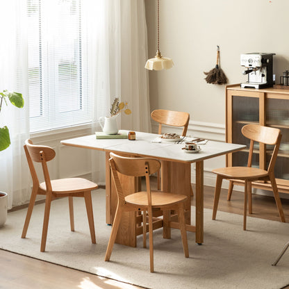 Simple dining chair set in natural wood around a wood dining table by Unique Piece Furniture on Tampa Home & Garden Store