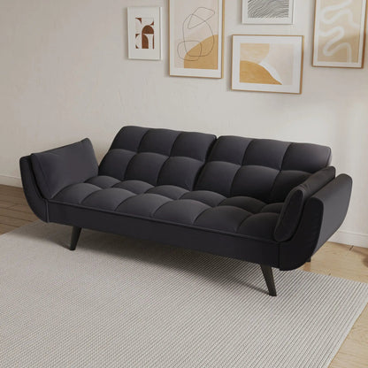 Dark gray tufted futon sofa with two armrests and plush cushions for small spaces on Tampa Home & Garden Store