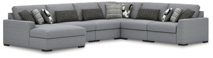 Bealton Sectional sofa by Unique Piece Furniture in gray boucle with coordinating pillows on Tampa Home & Garden Store