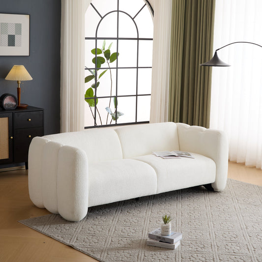Tonson 83in 3-Seater Boucle Sofa in white boucle fabric in a chic living room with arched window on Tampa Home & Garden Store