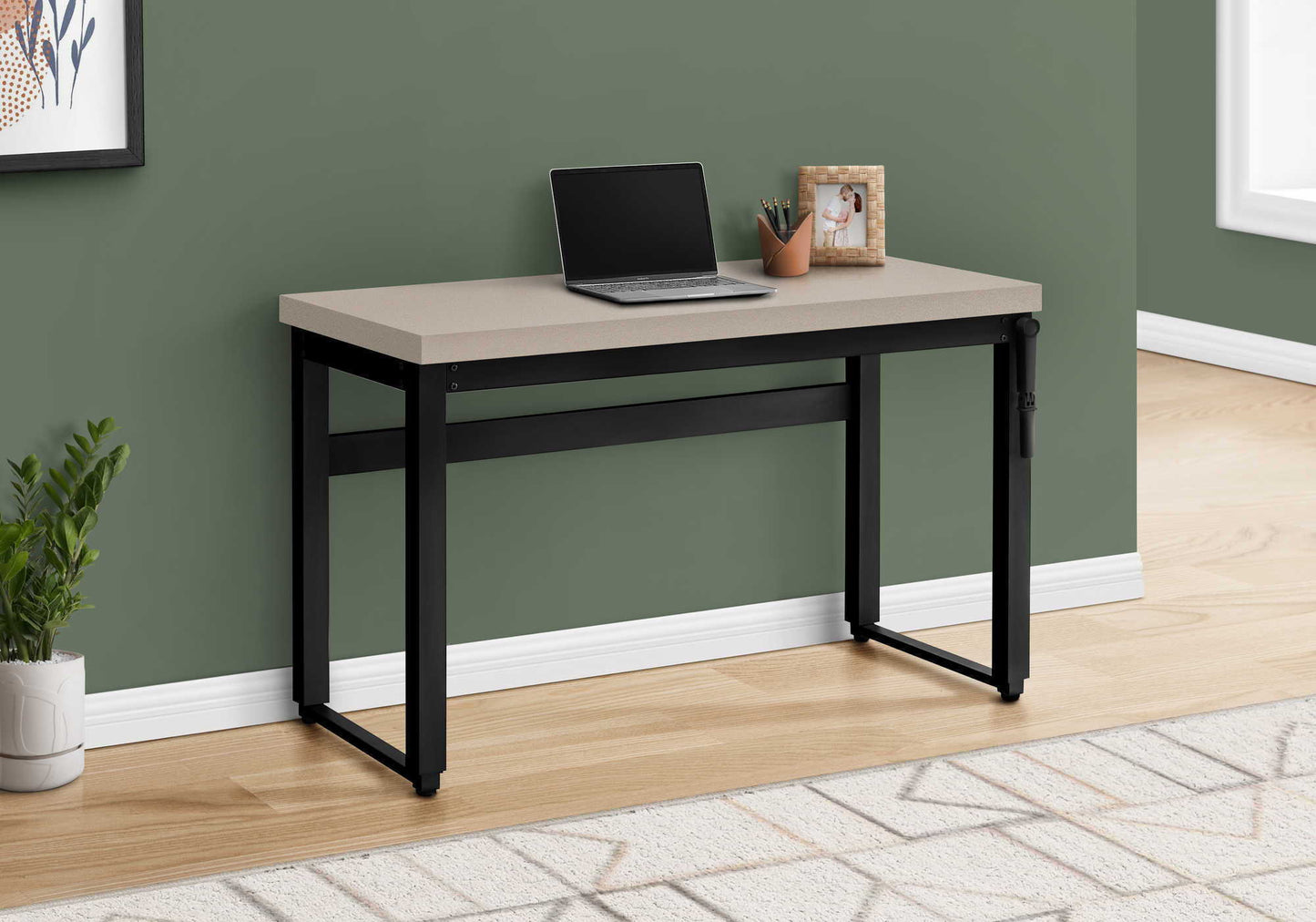 Adjustable standing computer desk by HouseOfZazla with beige top and black frame, laptop on Tampa Home & Garden Store