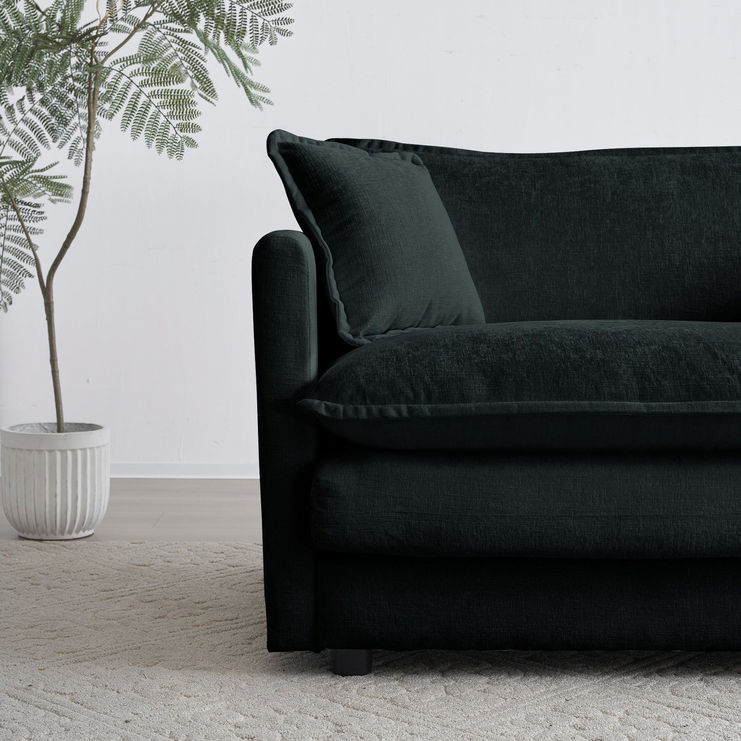 Comfy deep single-seat upholstered reading armchair in dark charcoal fabric with cushions on Tampa Home & Garden Store
