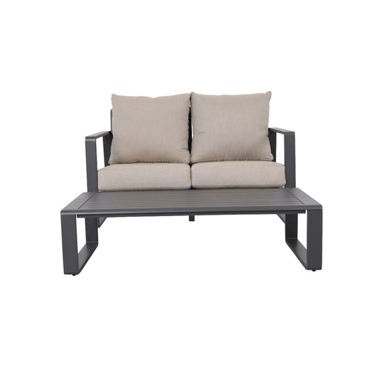 Outdoor sofa with rectangular coffee table in gray metal frame and beige cushions on Tampa Home & Garden Store