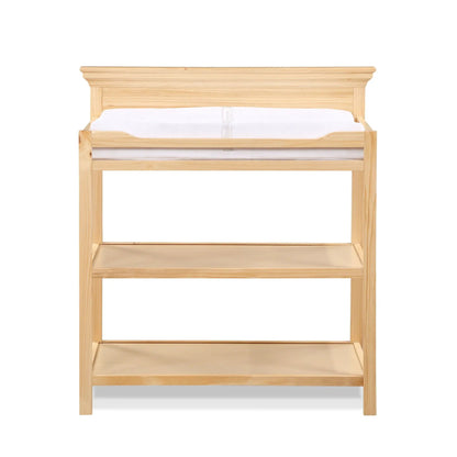 Universal changing table in natural pine wood with white changing pad and open lower shelf on Tampa Home & Garden Store