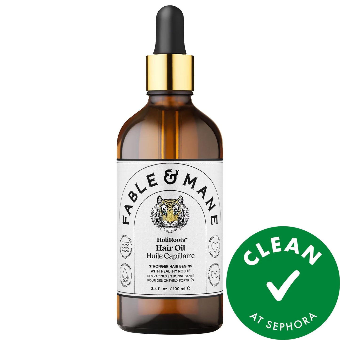 HoliRoots Hair Oil bottle with amber glass, black dropper cap and tiger logo label on Tampa Home & Garden Store
