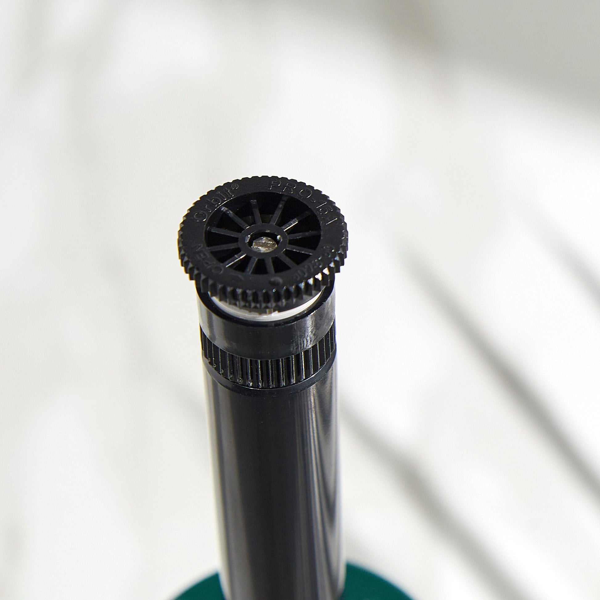 4-inch hard-top pop-up sprinkler by Orbit Irrigation with pressure-regulating, 15 ft nozzle on Tampa Home & Garden Store