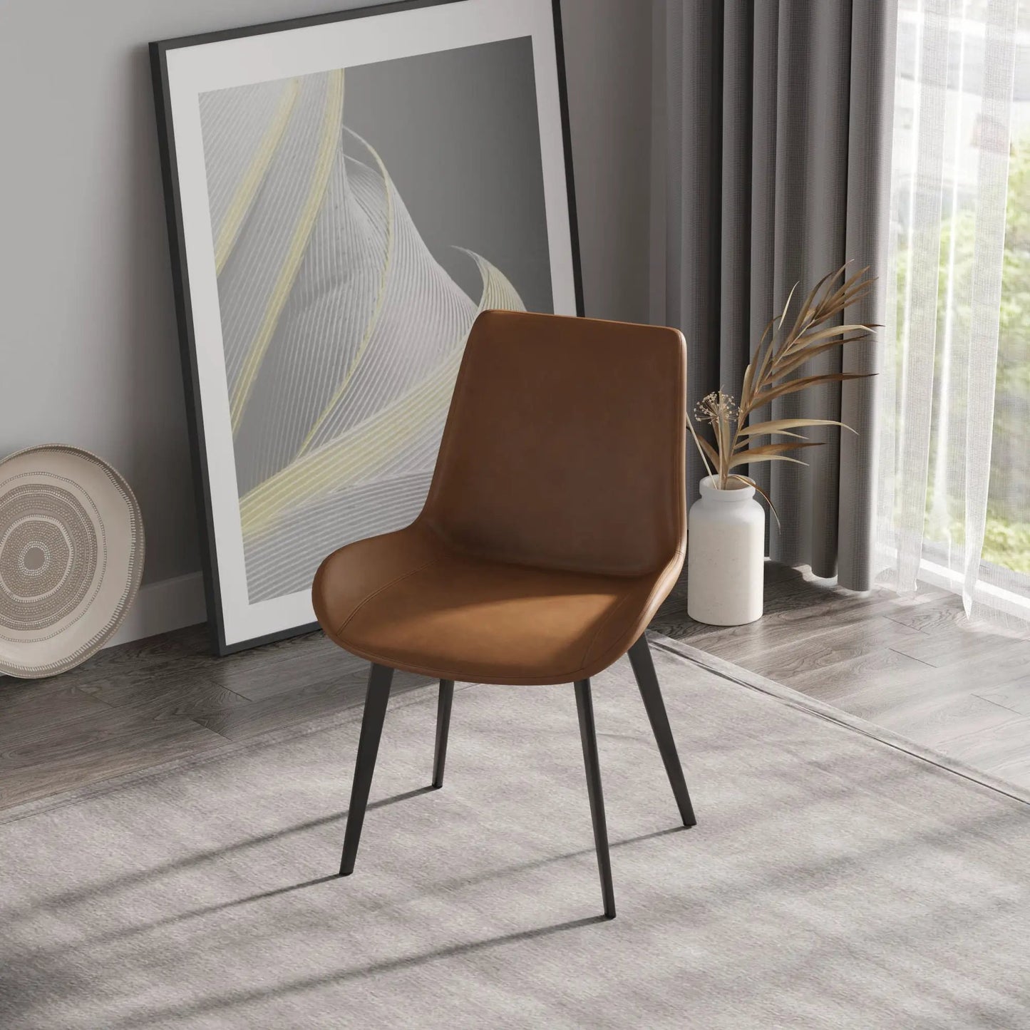 Modern dining chair with brown leather seat and black metal legs on Tampa Home & Garden Store