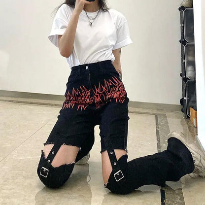 Trendy black high-rise jeans by FLIPSTYLEZLLC with stitchable metal buckles and ripped knees on Tampa Home & Garden Store