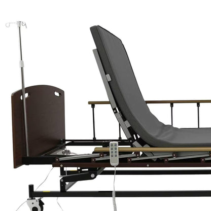 Electric hospital bed with grey mattress, black frame, and remote by HouseOfZazla on Tampa Home & Garden Store