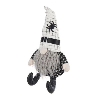 Sitting gnome figurine with grid-pattern hat, gray beard, and black spider Halloween decor on Tampa Home & Garden Store