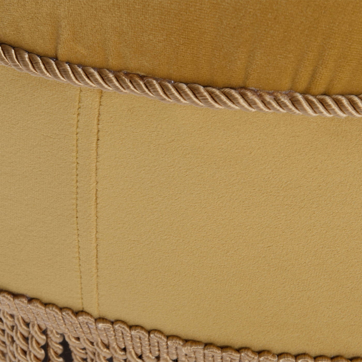 Luxurious round upholstered ottoman with rope fringe in mustard yellow by HouseOfZazla on Tampa Home & Garden Store