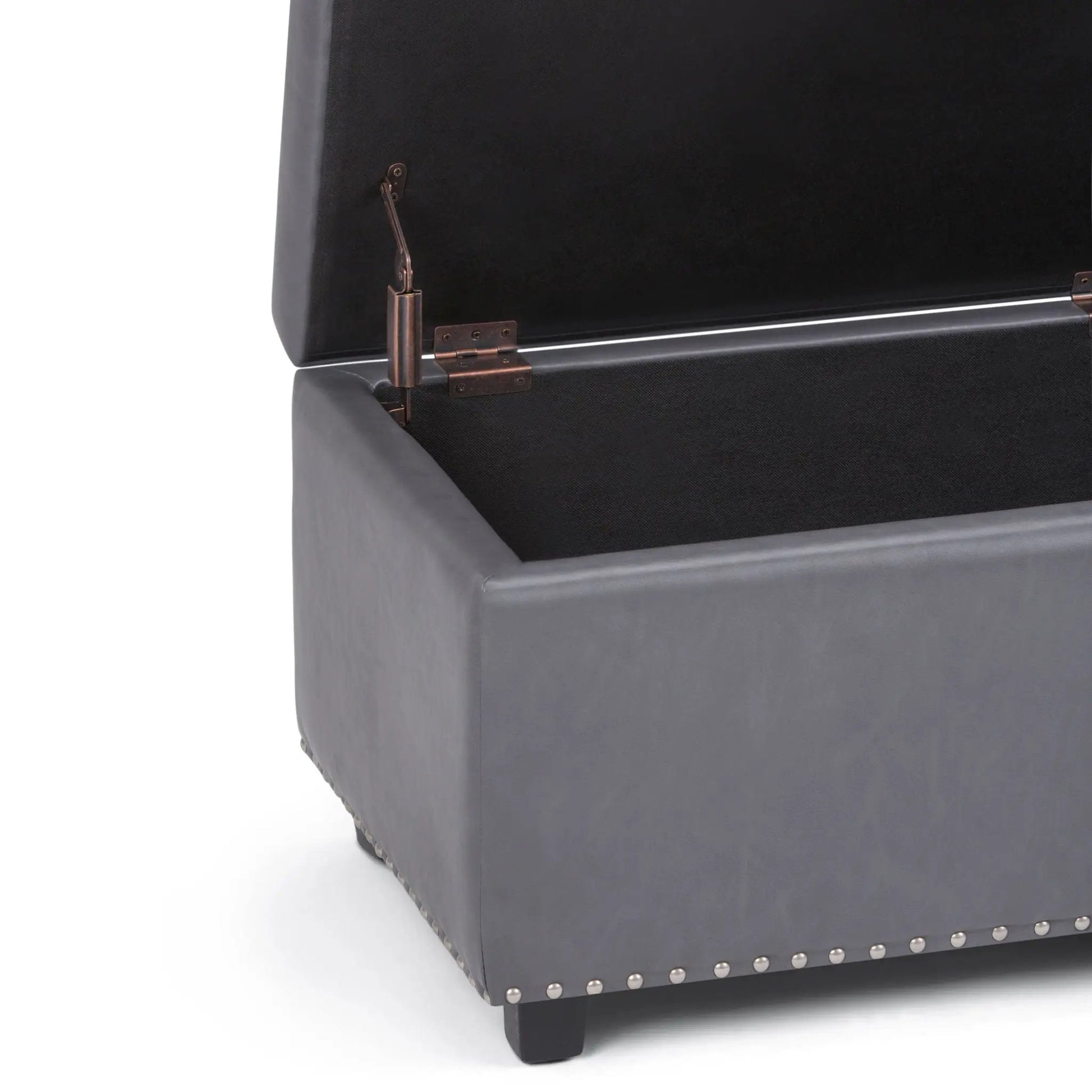 Hamilton Upholstered Storage Ottoman in dark grey fabric with copper hardware and nailhead trim on Tampa Home & Garden Store