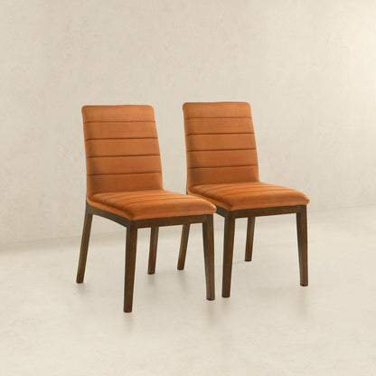 Set of 2 orange modern dining chairs with cushioned backs and solid wood legs on Tampa Home & Garden Store