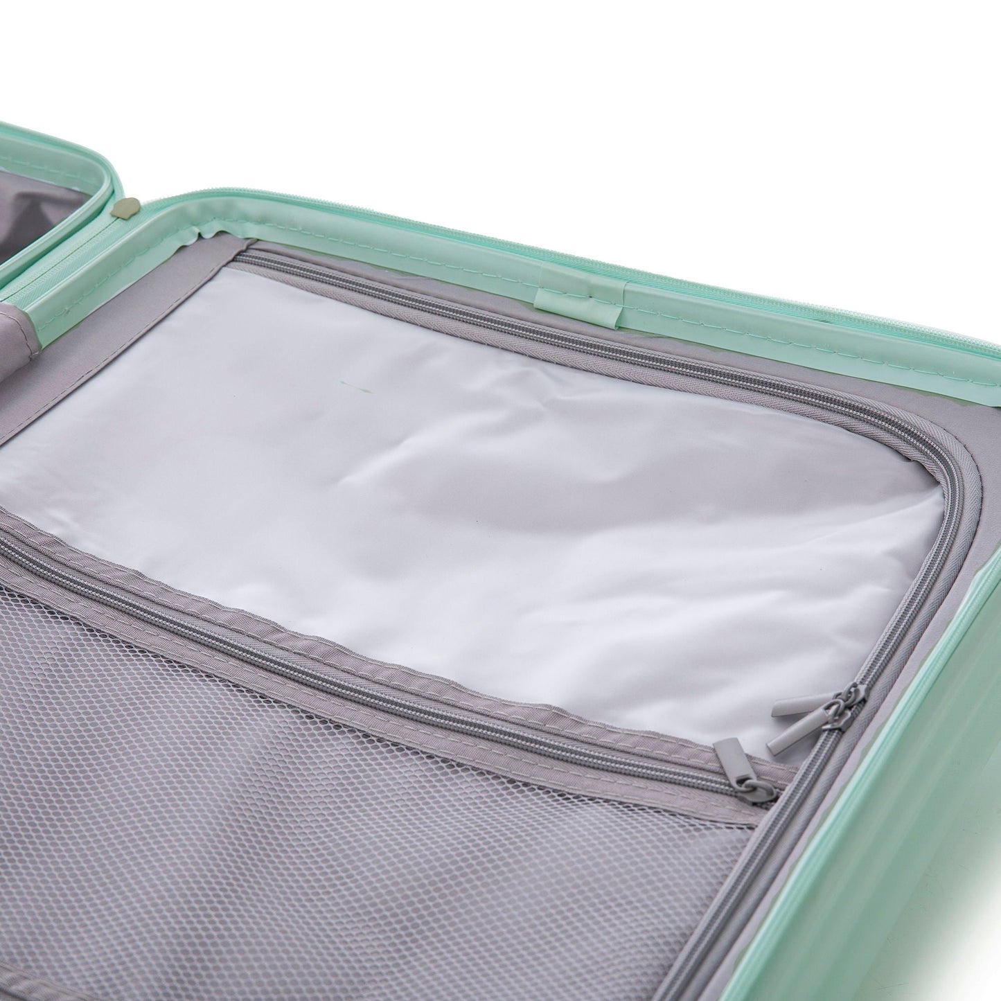 Mint green carry-on luggage interior with gray lining and zip mesh pocket on Tampa Home & Garden Store