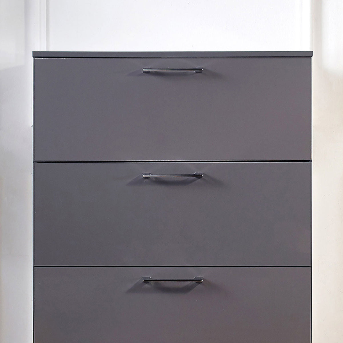 Glossy dark gray 4-drawer accent chest with slim metal handles on Tampa Home & Garden Store
