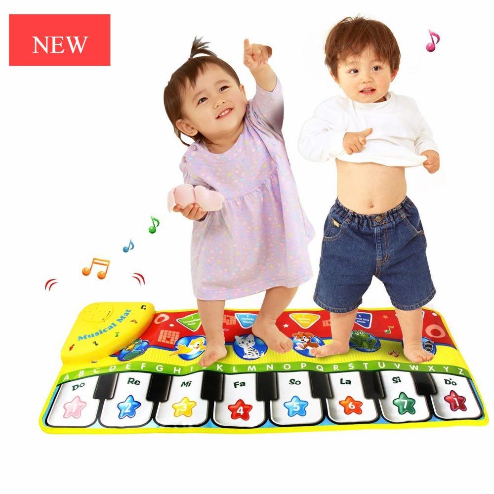 Stevvex piano mat toy with colorful keys; two kids enjoy educational musical carpet on Tampa Home & Garden Store