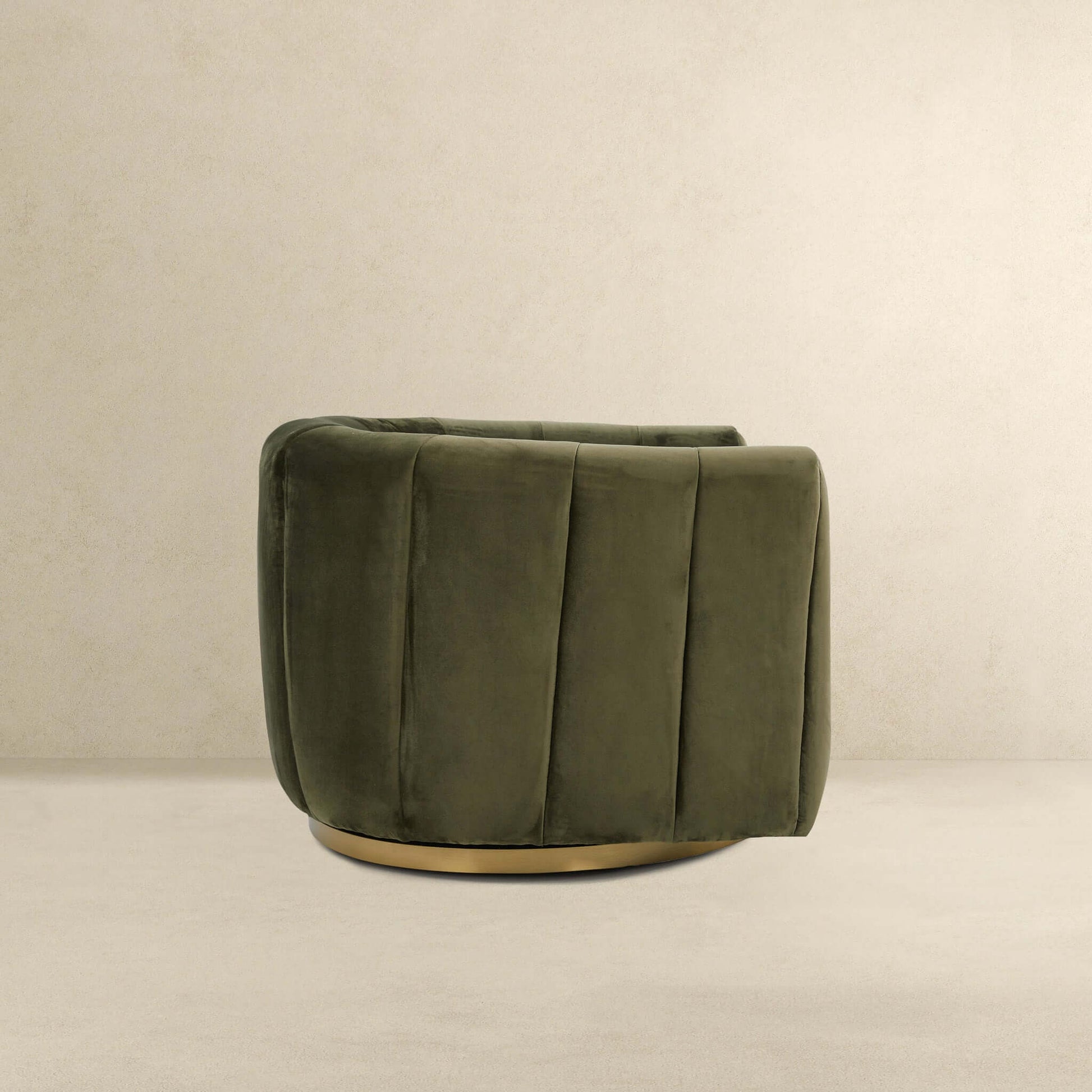Cosey Green Velvet Swivel Chair with plush green upholstery and a round brass base on Tampa Home & Garden Store