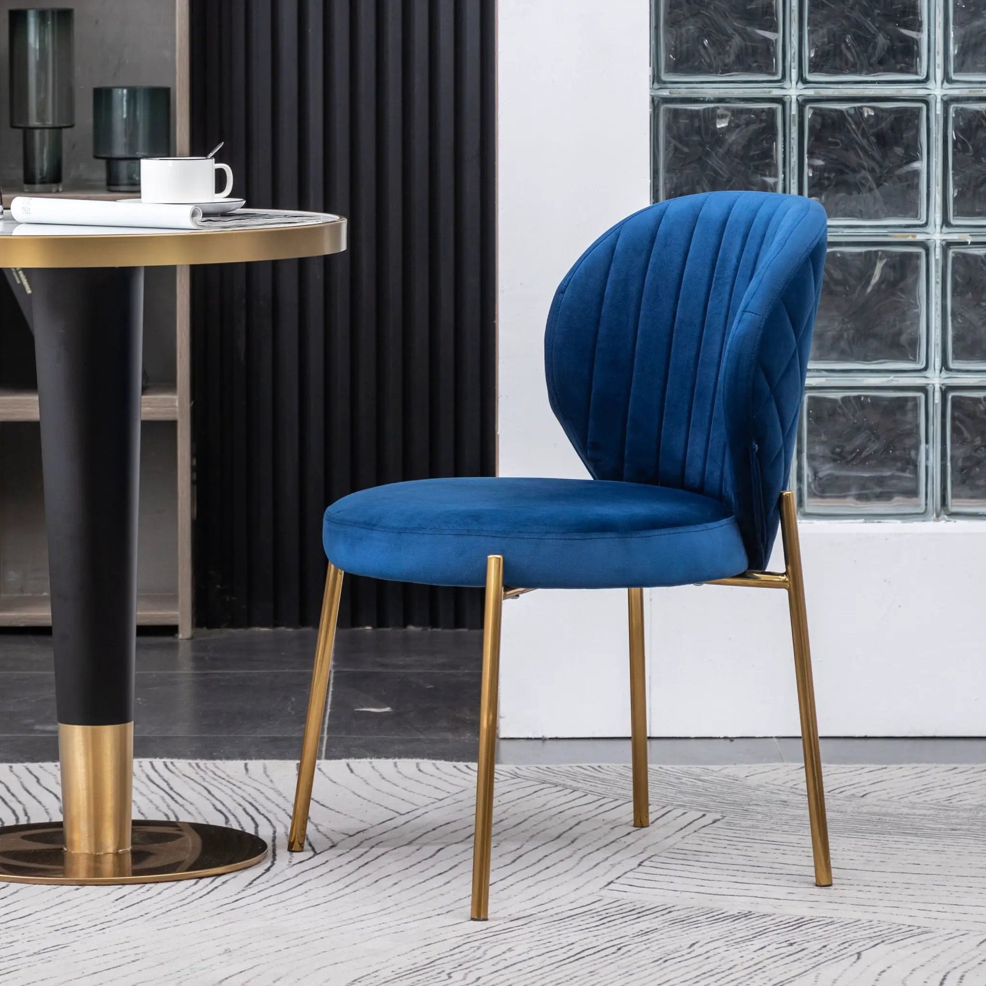 Amoa blue velvet dining chair by Unique Piece Furniture with gold legs on Tampa Home & Garden Store