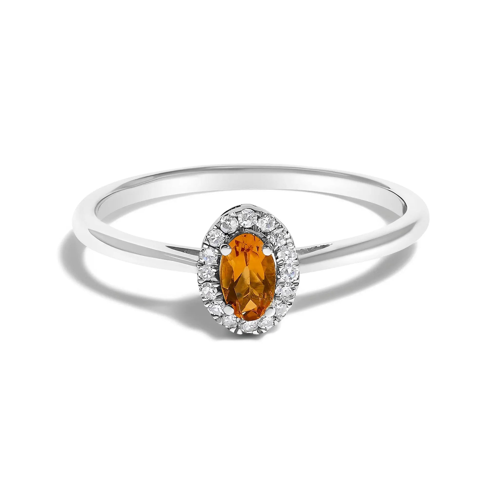 10K white gold halo ring with orange oval gemstone and diamond accents, size 6.5, Bids.com on Tampa Home & Garden Store