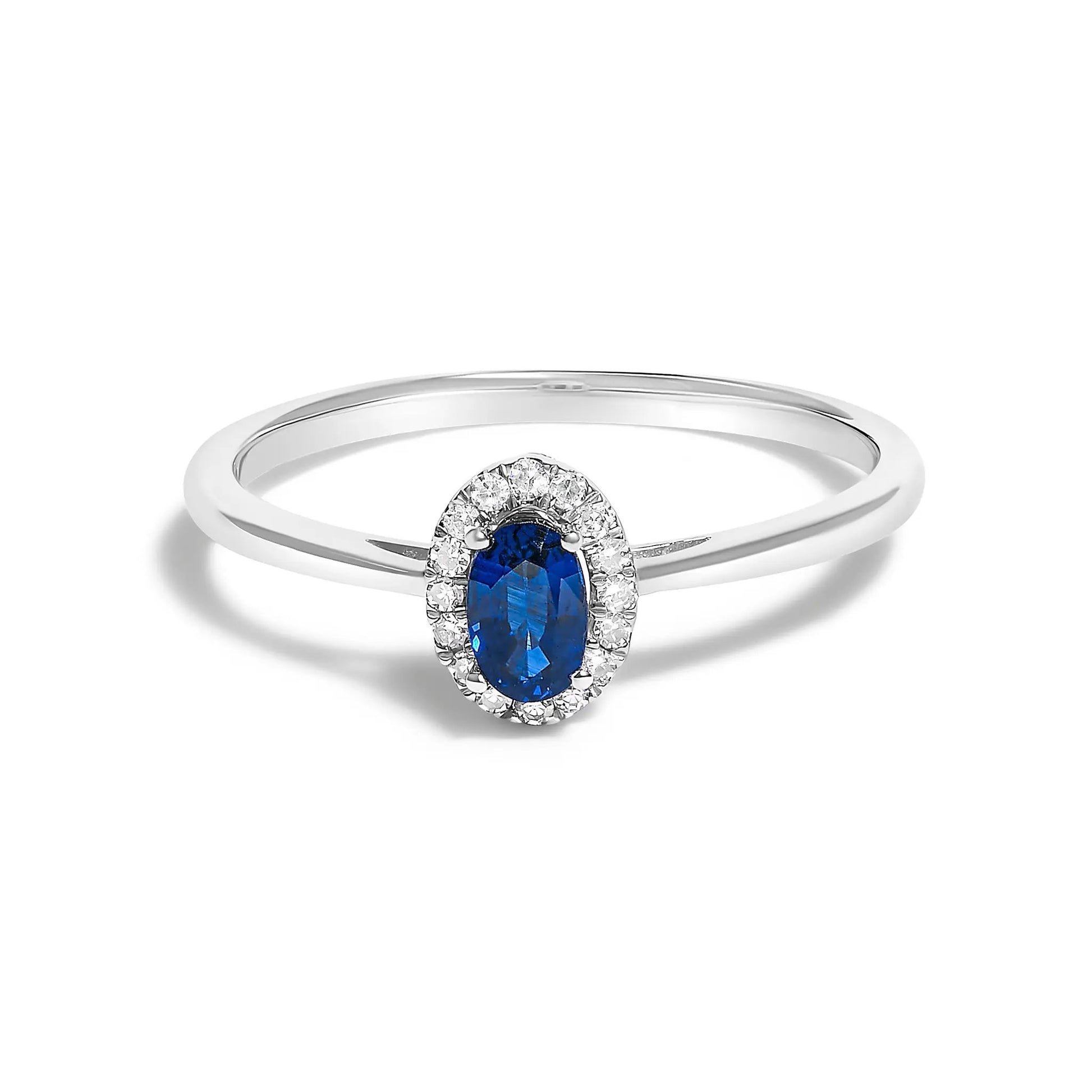 10K white gold halo ring with oval blue gemstone and diamond accents size 6.5 by Bids.com on Tampa Home & Garden Store